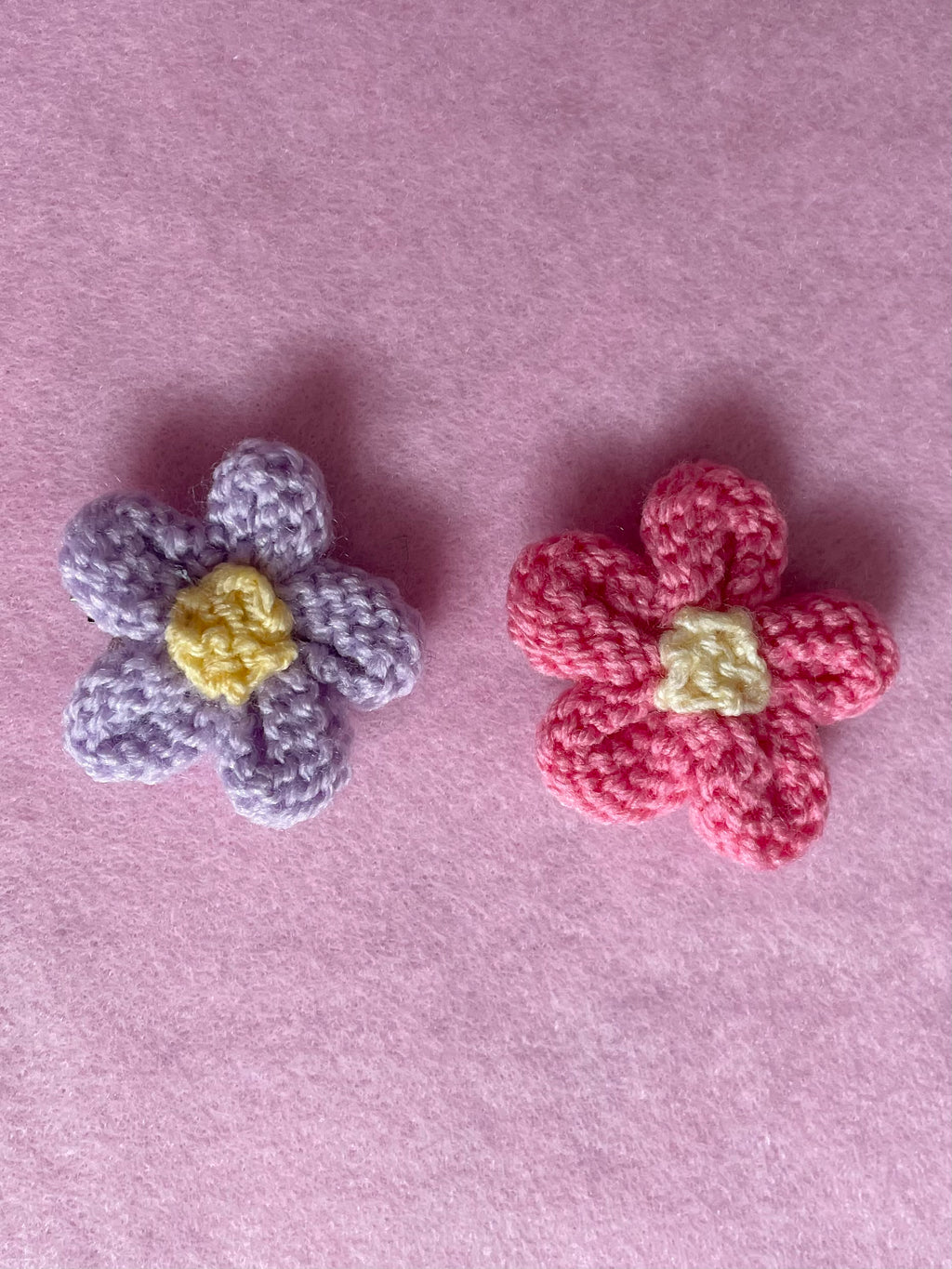 Flower pins (purple and pink)