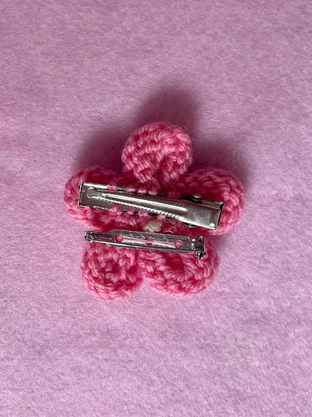 Flower pins (purple and pink)